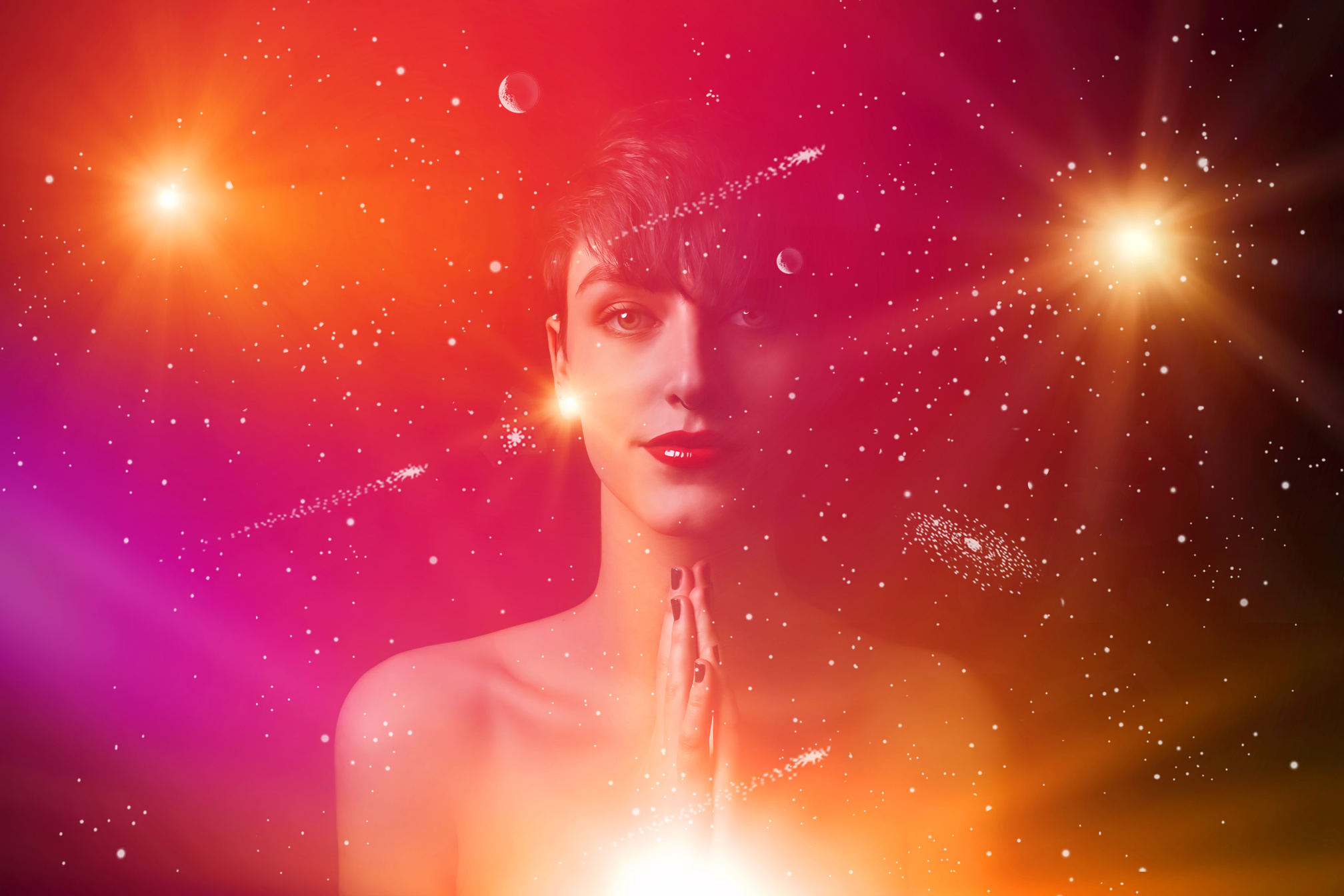 Young woman surrounded by the universe